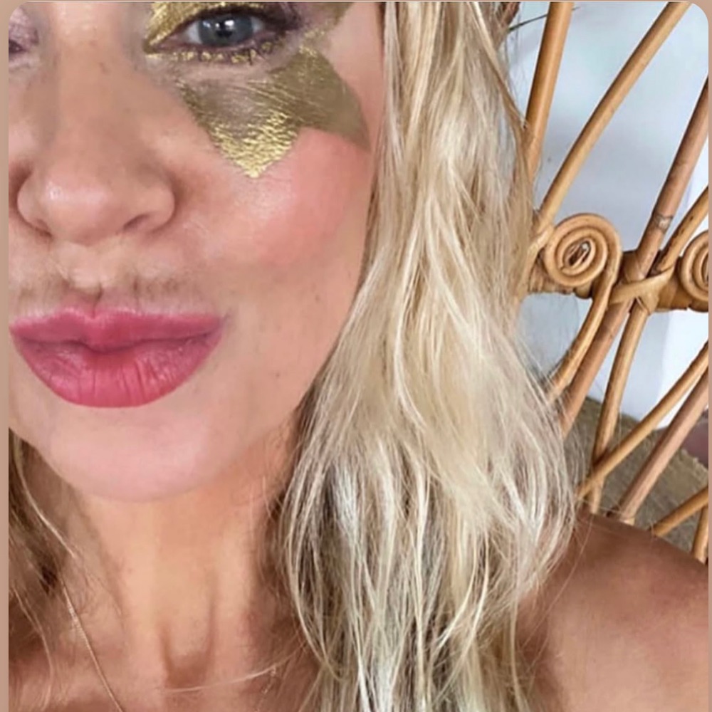 Natasha Shae wearing gold leaf makeup